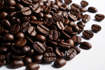 Fototapeta premium close up of coffee beans on white background.