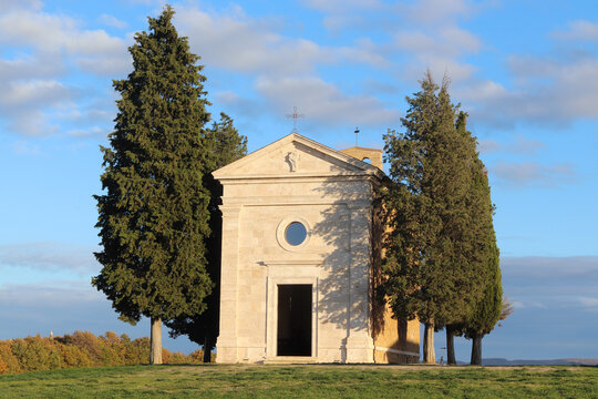 Pienza, Italy - November 25, 2024: Cappella della Madonna di Vitaleta in countryside between San Quirico and Pienza in Val d'Orcia Tuscany. Autumn season.