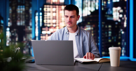 Man Studying And Working On Laptop