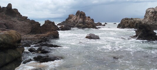 sea rock at the beach background