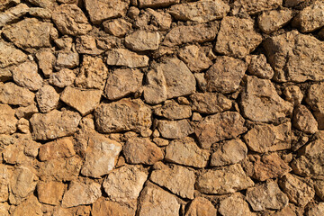 Ancient wall made of stones in the Egyptian desert, Sinai Peninsula. Background