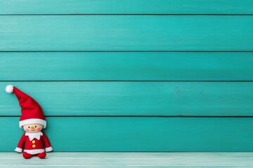 Fototapeta premium Cute Santa Doll on White Background with Copy Space for Holiday Design.