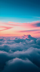 Obraz premium Vibrant Sunset with Pink and Blue Clouds, Soft Light, and a Peaceful Horizon, Creating a Serene and Dreamy Sky at Dusk with Expansive Cloudscape