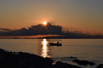 Fisherman making the most of the last light