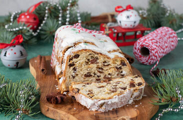 Christmas German Stollen on wooden board. Traditional treats