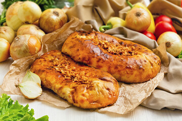 Handmade tandoor bread with fried onions.