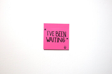 Motivational and love message on a sticky notes with isolated white background.