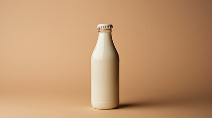 Creamy bottle of milk on a warm-toned background, highlighting its smooth texture and simplicity at a minimalistic angle