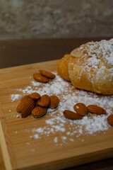 Almond croissant with powdered sugar