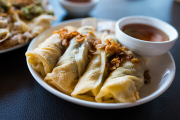 Spring roll made from egg. Close up