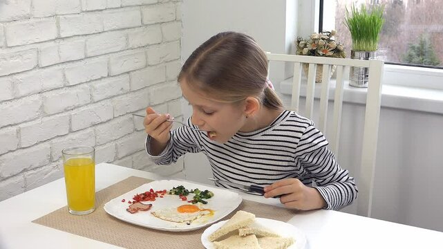 Child Eating Breakfast in Kitchen, Kid Eats Fried Eggs, Teenager Girl Enjoying Vegetables, Greenery Healthy Food
