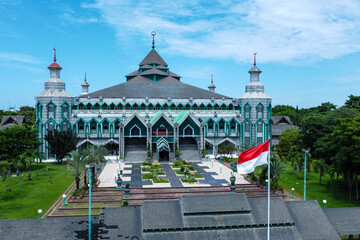 View of the Al Markaz Mosque from the front on a sunny day