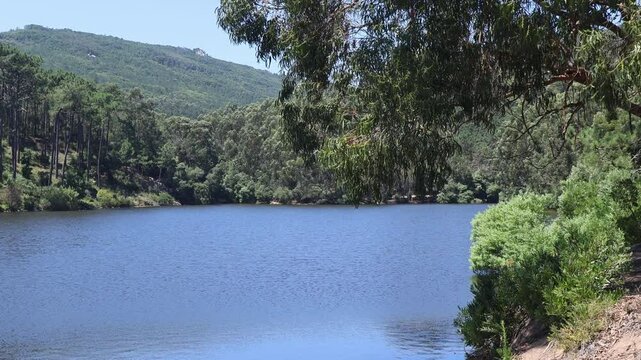 Scenic sunny view of Rio da Mula Dam in Serra de Sintra in Portugal