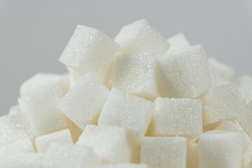 Cubes of white crystalline beetroot refined sugar.