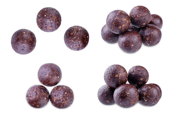 Nuts dates cocoa powder vegetarian balls on a white isolated background