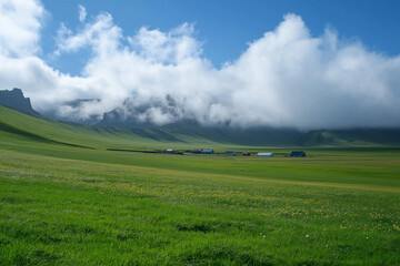 Peaceful green grassland and blue sky with scattered clouds near the horizon, photographed in high...