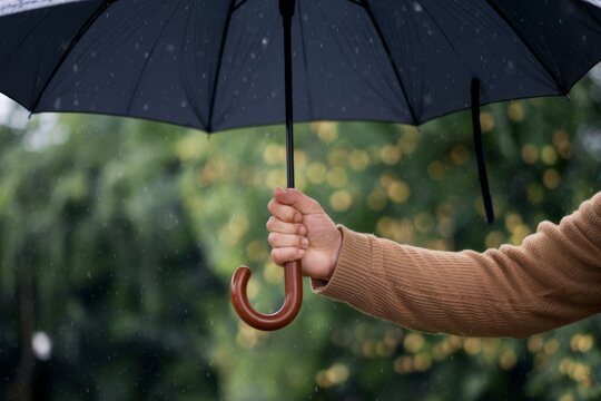 A person holding an umbrella.