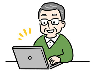 パソコンを使う笑顔の高齢者男性