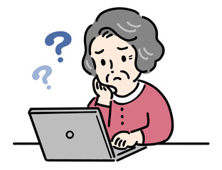 パソコンを見ながら悩む高齢者女性