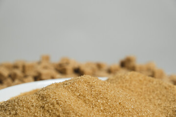 Brown cane unrefined demerara sugar, space for text.