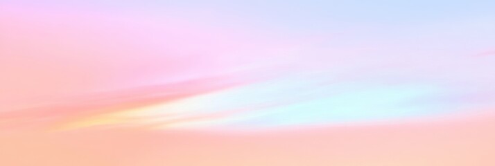 Fototapeta premium 美しい夕焼けの空が広がる薄いピンクと青のグラデーション