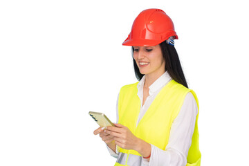 Female architect with helmet and vest ready for work