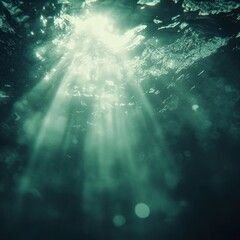 Naklejka premium Underwater Sunlight Beams Illuminate Dark Depths
