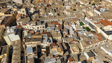 Fototapeta premium Aerial view of houses, buildings and apartments in the historic center of Lucera, in the province of Foggia, Puglia, Italy.