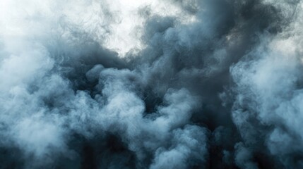 Fototapeta premium Abstract dark smoke billowing against a soft light background creating a dramatic and ethereal atmosphere for artistic compositions