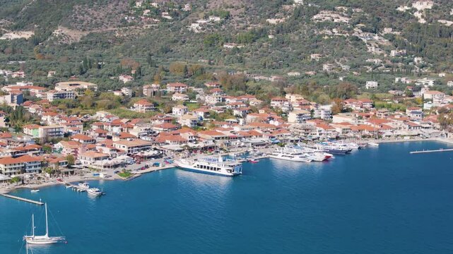 Aerial drone view of the coastal town of Nydri on the island of Lefkada in Greece.