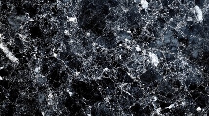 Granite texture background in dark tones showcasing natural stone patterns ideal for decorative design projects and interior architecture.