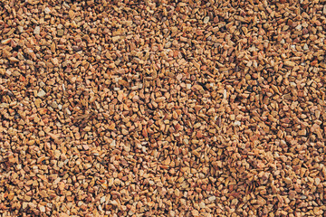 Gravel texture, small stones, natural material, construction, landscaping, earth tones, background,...