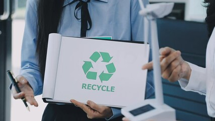 Group diverse Asia businesspeople talk ESG strategies risk management workshop night, SDGs, global warming, green finance and investment and net zero waste lifestyles in boardroom training building. - Powered by Adobe