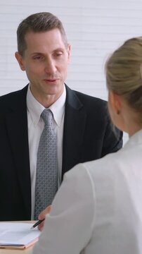 Job seeker in job interview meeting with manager and interviewer at corporate office. The young interviewee seeking for a professional career job opportunity . Human resources and recruitment concept.