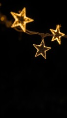 A beautiful, warm, and inviting image of a glowing star-shaped Christmas light, perfect for holiday-themed backgrounds and designs.