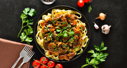  Homemade tasty beef stroganoff with mushrooms and pasta