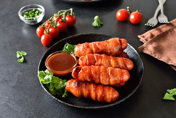 Homemade bacon wrapped sausages