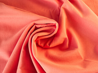 Pink cotton fabric. Woven texture background. Pink natural textile drapery for sewing, fashion and...