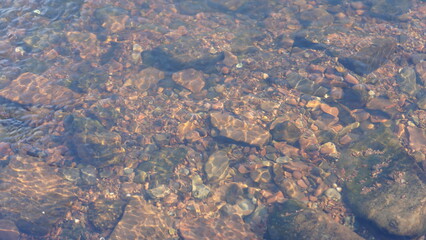 The clear water flow in the river