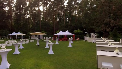 Elegant Outdoor Event Setup with Luxury Decor in a Forest Venue