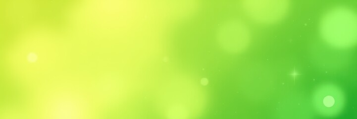 Colorful bokeh background with vibrant green and yellow hues creating a fresh spring atmosphere