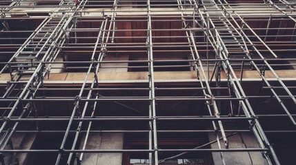 Obraz premium Steel Scaffolding Structure on Building Exterior