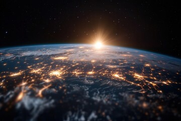 Obraz premium Witness a breathtaking view of Earth at sunrise, showing the intricate networks of human civilization against the backdrop of space highlighting our planet's beauty.