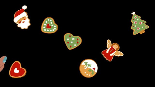 Christmas gingerbread cookies. Hands grabbing a Christmas cookie on a transparent alpha channel.