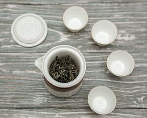 An Elegant and Serene Tea Ceremony Featuring a Beautiful Porcelain Teapot and Matching Cups