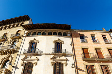 Fototapeta premium Colorful old houses along the Plaza Mayor de Vic square in Vic, Barcelona, Catalonia, Spain, Europe