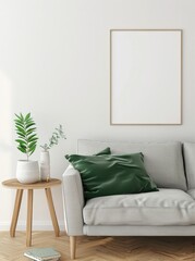 A minimalist living room with a gray sofa. a green pillow. a wooden side table. and a framed poster on the wall