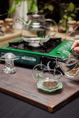 An Elegant Tea Brewing Setup with a Teapot and Loose Tea Leaves for a Delightful Experience