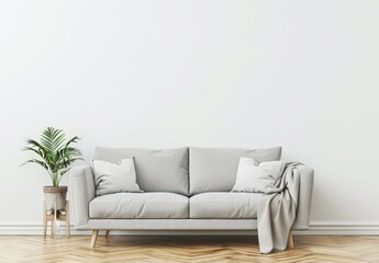 Minimalist living room interior with a grey sofa. throw blanket. and a plant in a pot on a wooden stand. set against a white wall with wood flooring