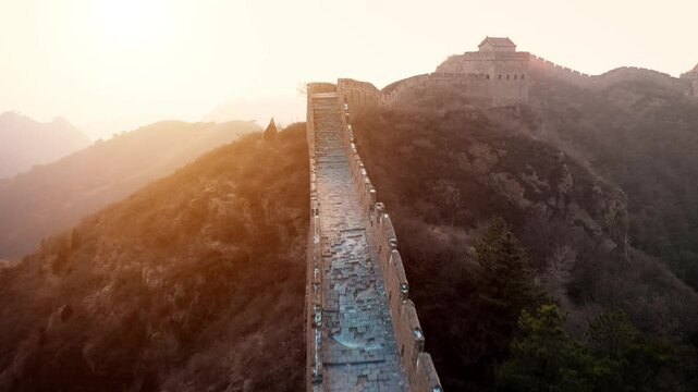 Flying over the Great Wall of China at sunset